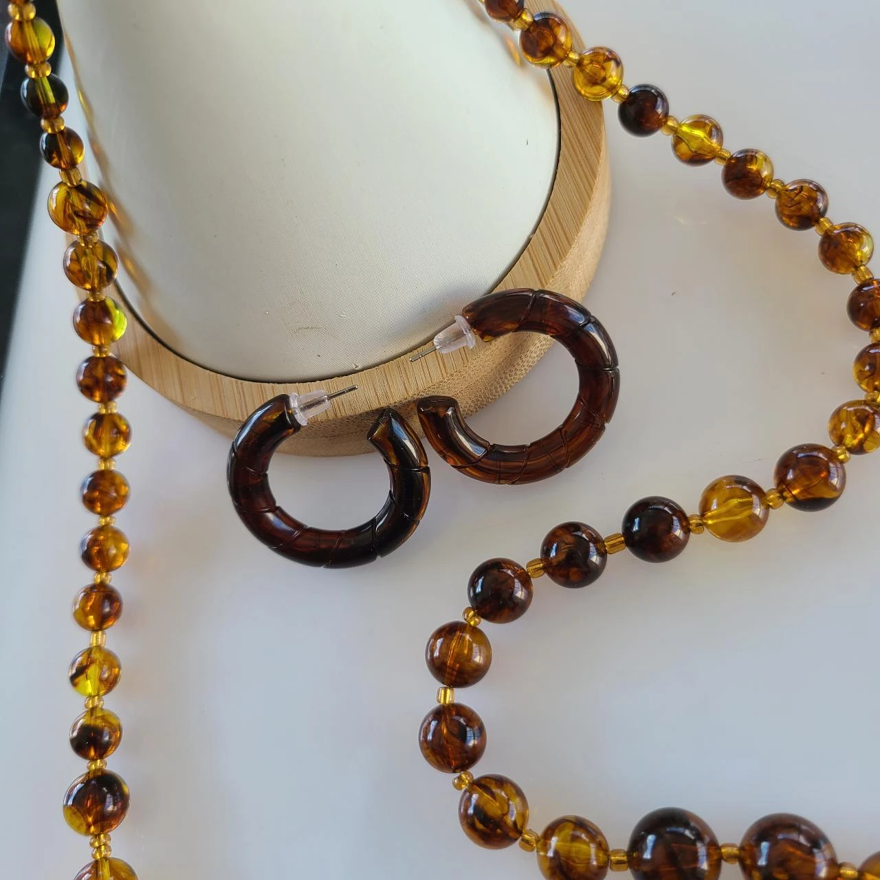 Set ketting & oorbellen van transparante harsparels amber marmer PA611 – photo 4